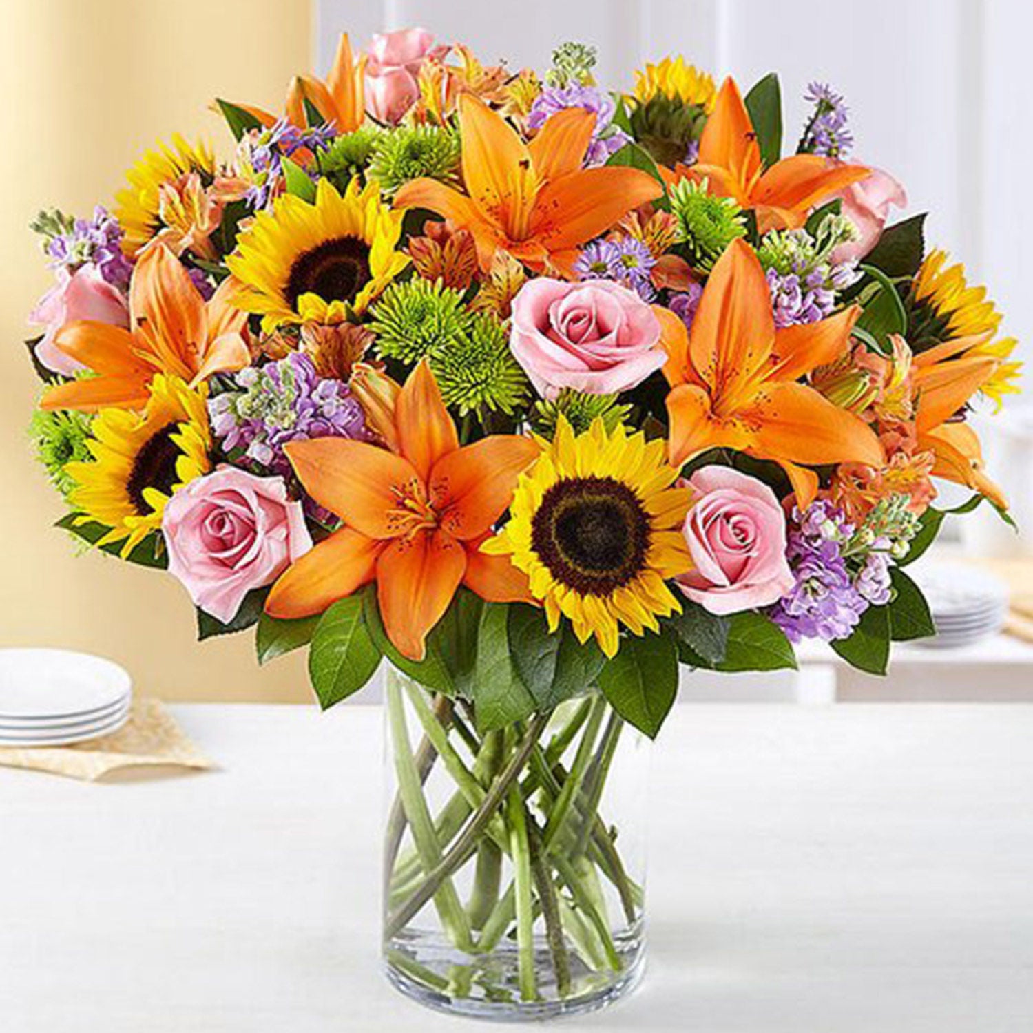 Vibrant Bunch of Flowers In Glass Vase