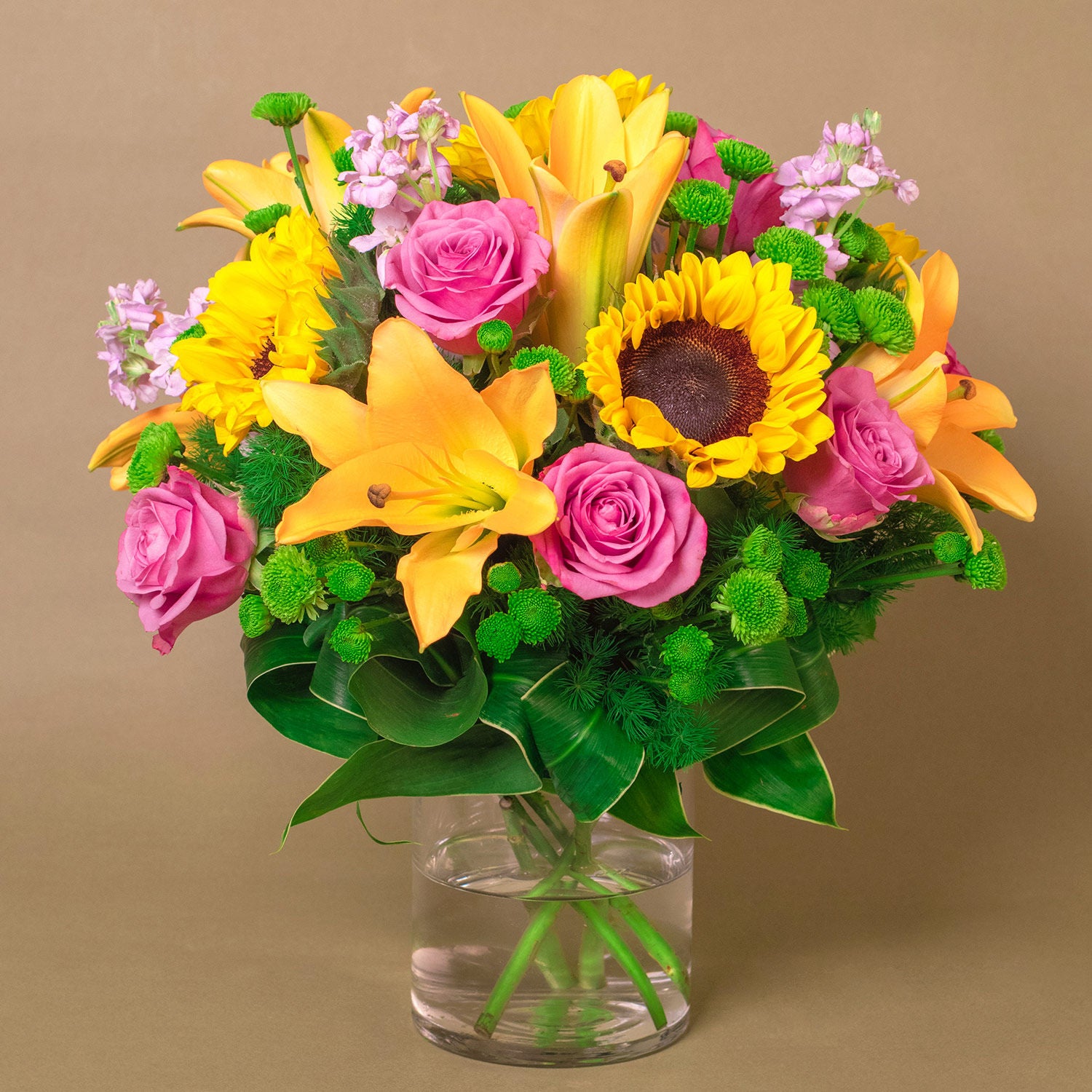 Vivid Bunch Of Flowers In A Glass Vase