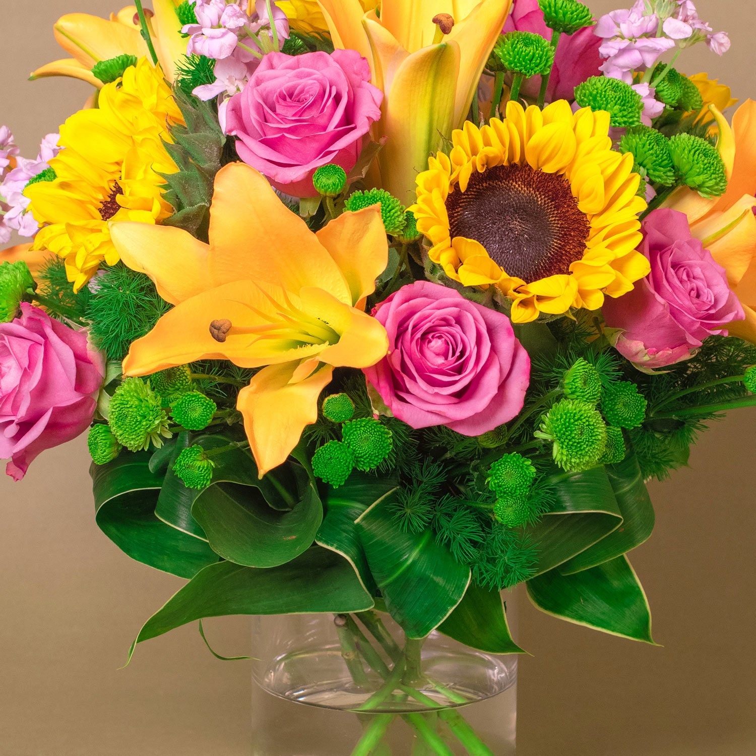 Vivid Bunch Of Flowers In A Glass Vase