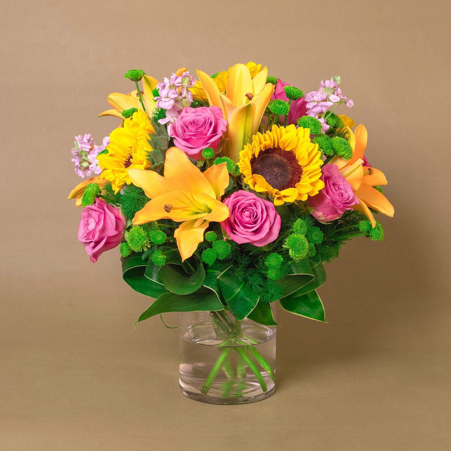 Vivid Bunch Of Flowers In A Glass Vase