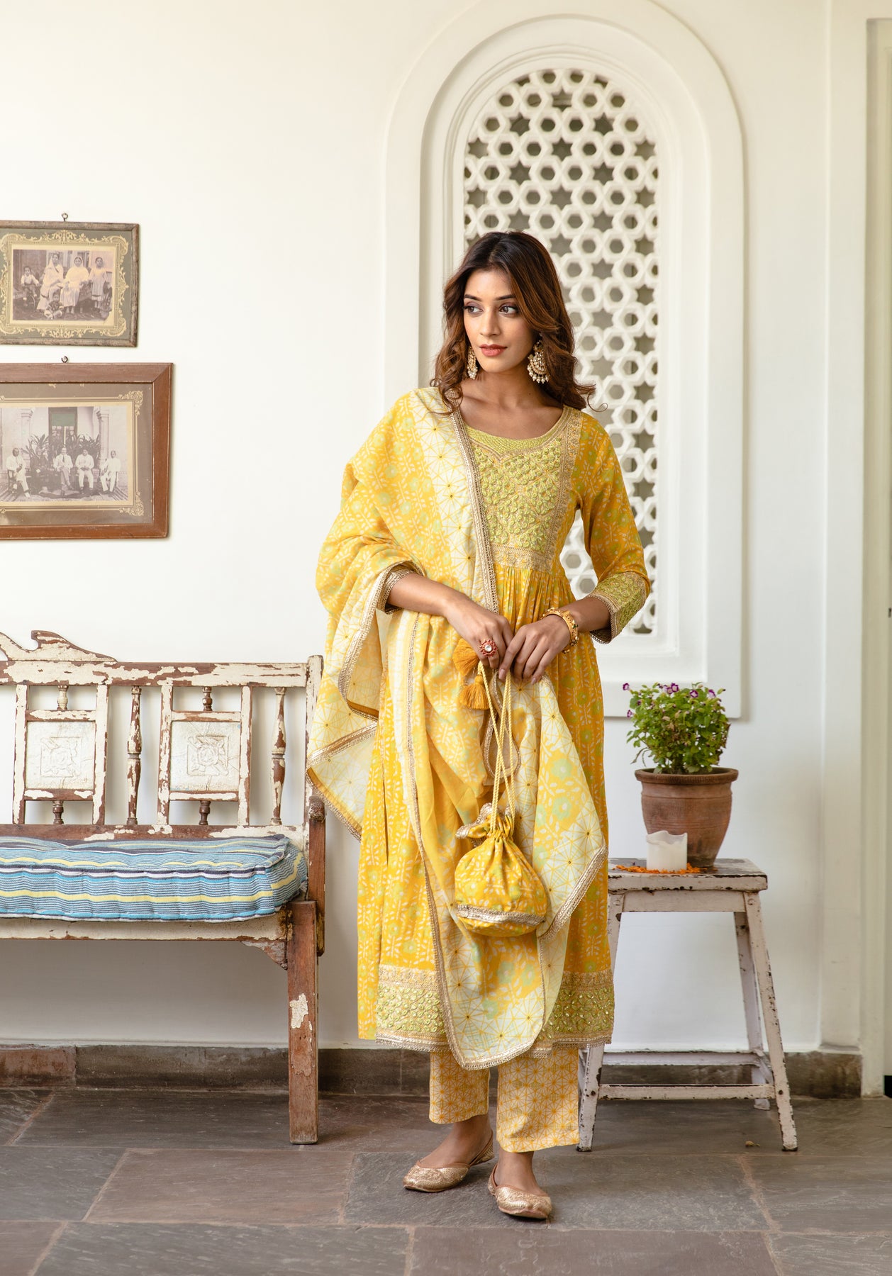 women-yellow-rayon-nyara-cut-a-line-kurta-trouser-and-dupatta-set-nmk1788