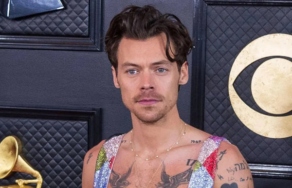 Harry Styles at the Grammys wearing Egonlab x Swarovski jumpsuit