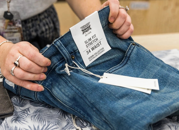 folded denim jeans store