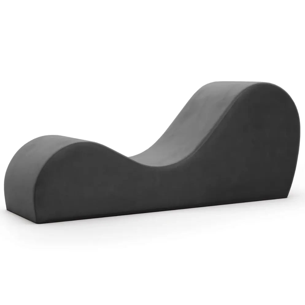 Black Liberator Cello chaise with curved ergonomic shape, discreet bondage furniture for sex dungeon or BDSM room