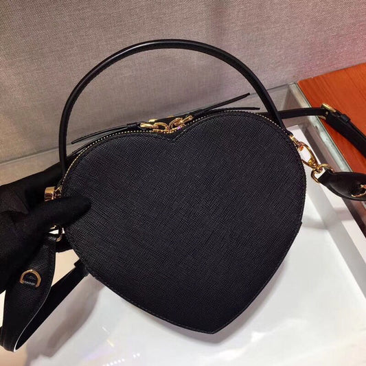 Prada odette heart bag pink preorder, Luxury, Bags & Wallets on Carousell