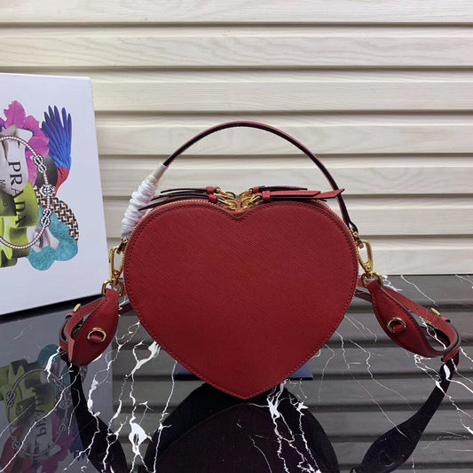 Prada odette heart bag pink preorder, Luxury, Bags & Wallets on Carousell