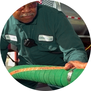 man inspecting hose safety