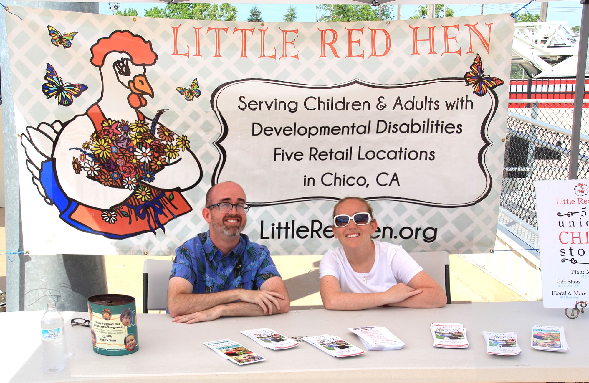 Little Red Hen Staff Members at an event booth