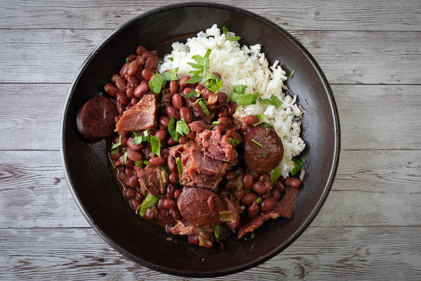Red beans mixed with pork and sausage, served in a bowl over white rice