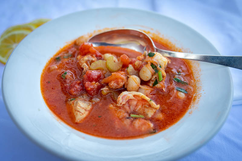 Fish and shrimp stew with Rancho Gordo alubia blanca beans, tomatoes, and herbs.