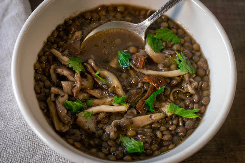Lentil soup with mushrooms and fresh herbs