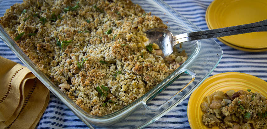 Baked casserole with yellow eye beans, fennel, and breadcrumbs.