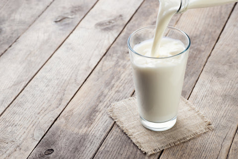 Milk being poured into glass