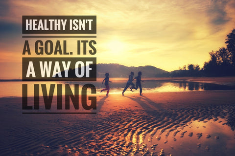 Healthy isn't a goal. It's a way of living. With beach sunset and people running