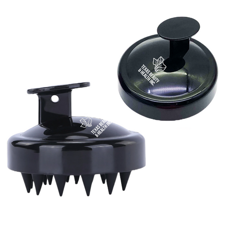 A black Texas Beauty & Health Scalp Massager Shampoo Brush. The brush features soft bristles and an ergonomic handle, designed to gently exfoliate the scalp during hair washing.