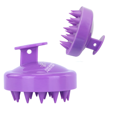 A purple Texas Beauty & Health Scalp Massager Shampoo Brush. The brush showcases a compact design with flexible bristles, ideal for promoting scalp health and relaxation during hair cleansing.