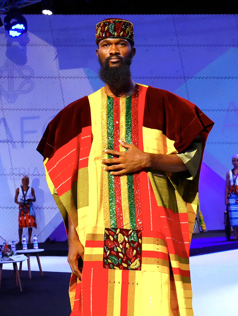 Model in a Mai Atafo Traditional Collection Aso Oke Kaftan at AFU Fundraising Fashion Show in Abidjan.
