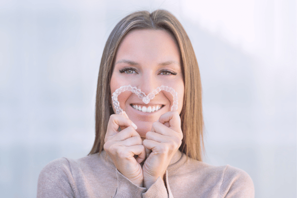 Girl Showing Her Clear Aligners