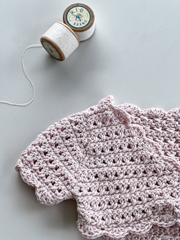 Pink cropped, cap sleeve crochet jersey (6-18 months)