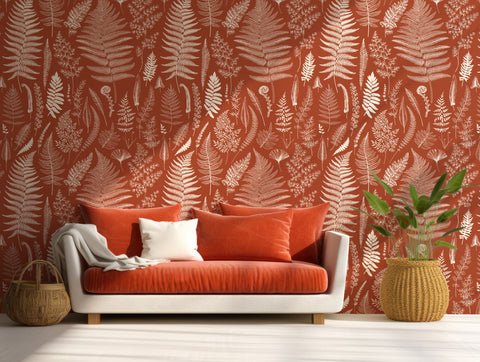 Fiery red plant illustration wallpaper in living room with white and deep red sofa with white and red cushions with plants either side of sofa