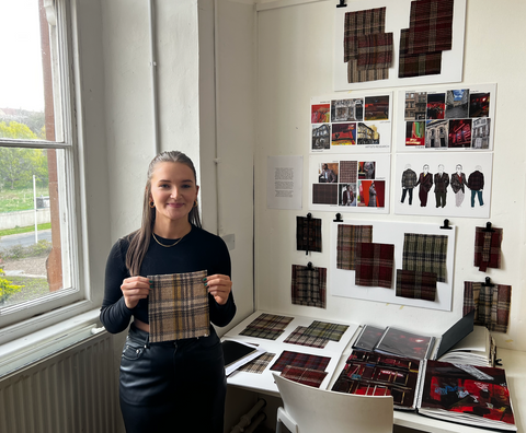 Student Lois Cowie with her winning textile design  