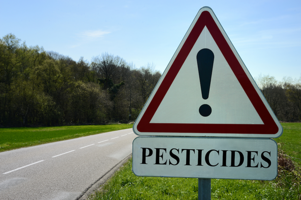 Warning road sign for pesticides