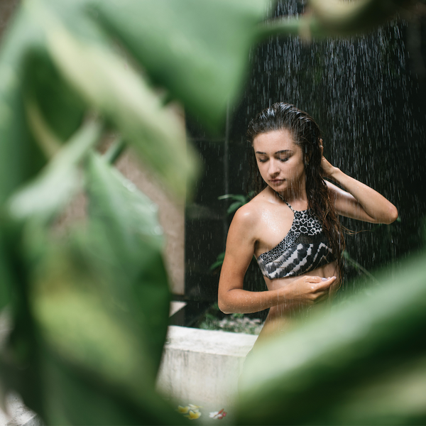 woman showering in nature