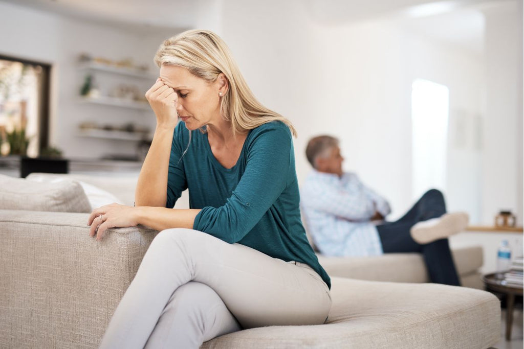 A woman experiencing mood swings due to lack of sleep