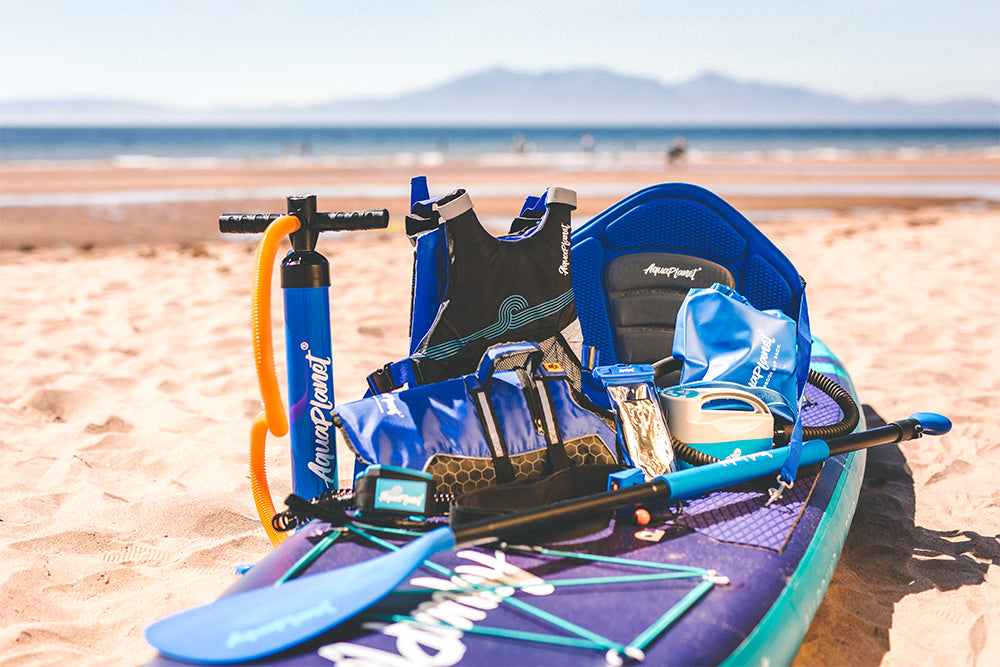 Aquaplanet paddle board and kit on the beach