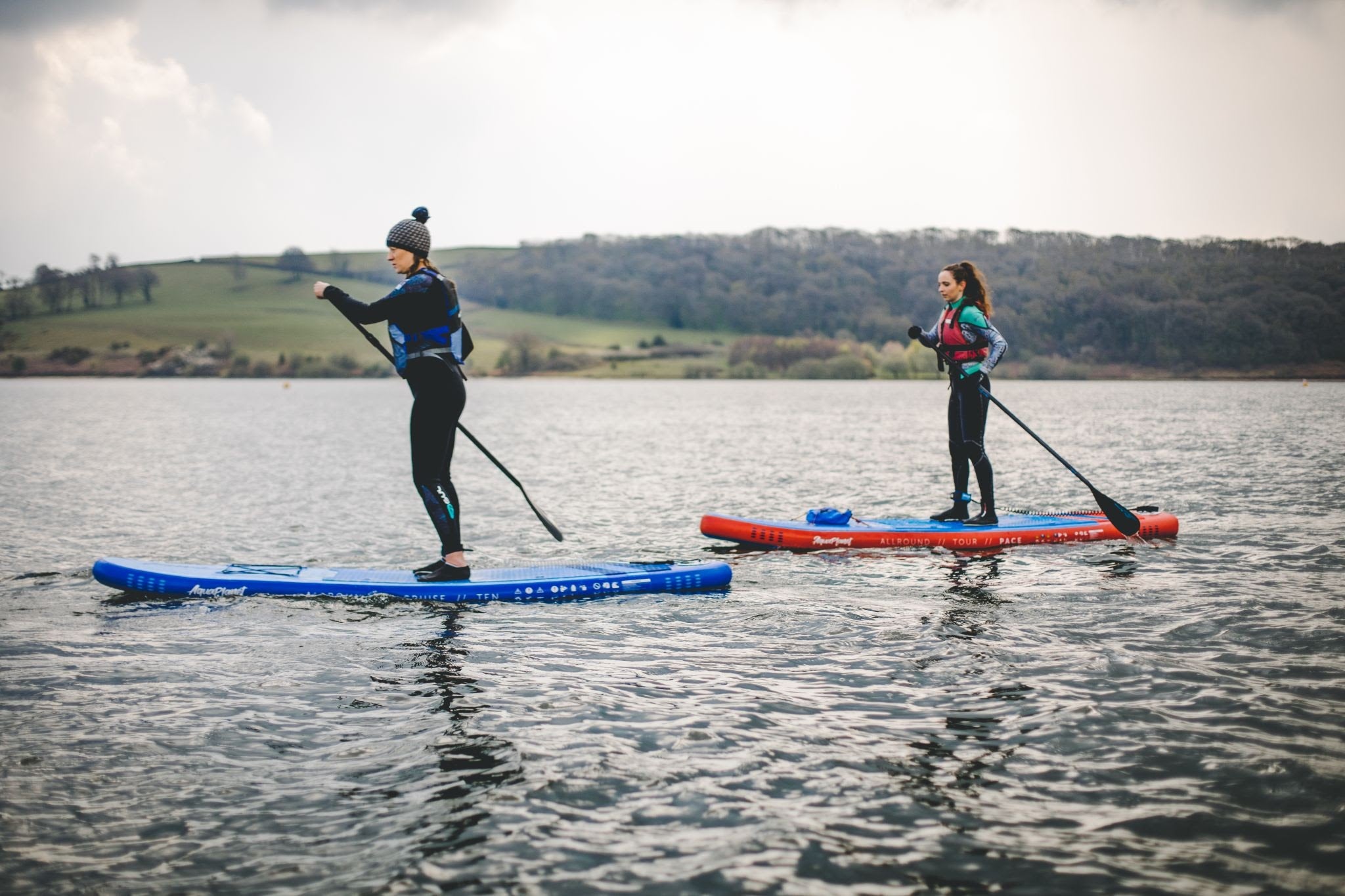 two people on an Aquaplanet Allround Ten and PACE in a lake