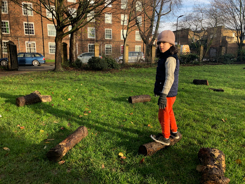 standing on a log