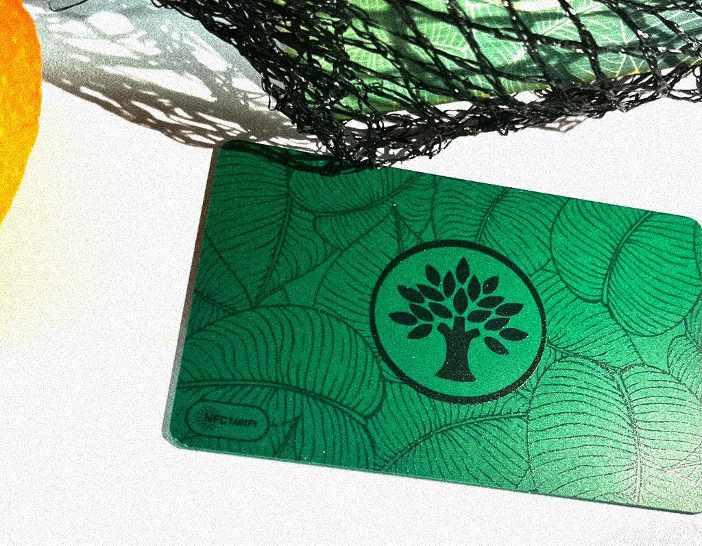 Green Wooden Digital Card on white background with a fruit net