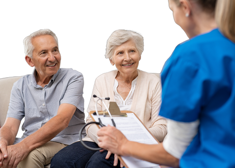 nurse talking to senior couple