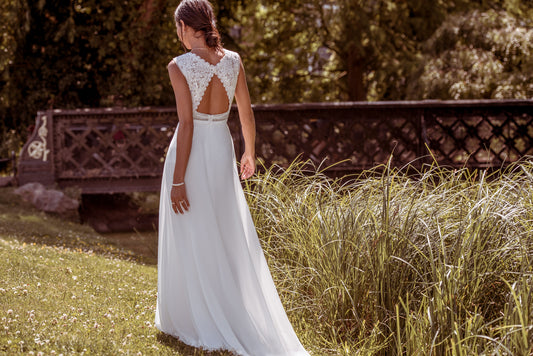 A romantic chiffon A-line wedding dress with long blouson sleeves and  delicate lace edging. – Kelsey Rose