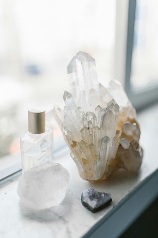 Clear Quartz crystal cluster in a window sill