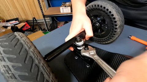 Tightening electric skateboard trucks