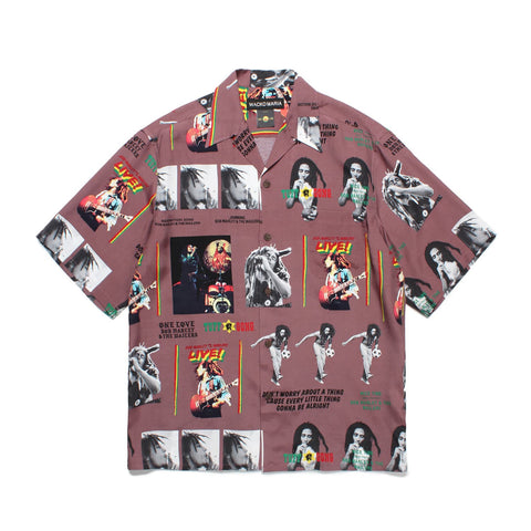 This Hawaiian shirt is made of 100% burgundy rayon fabric and features a graphic collage of images from Bob Marley's album covers and memorable moments from his life.