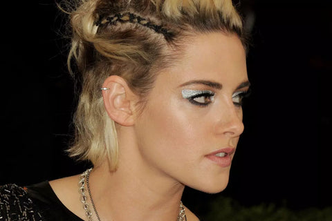 Kristen Stewart's helix piercing.