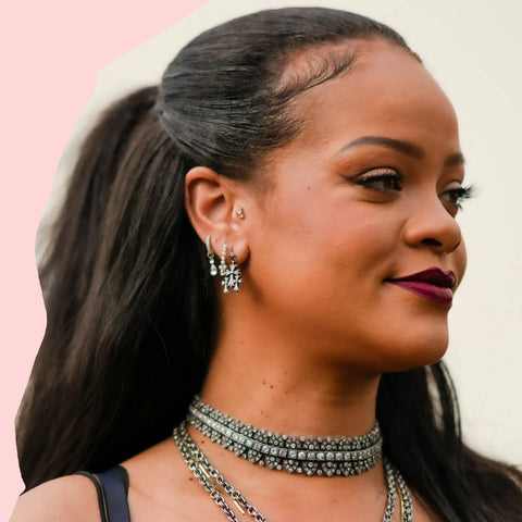 Rihanna with a tragus piercing.