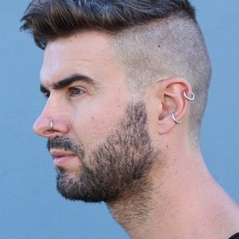 Variations of helix piercing styles for men at Luna.