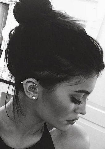 Kylie Jenner in a photoshoot with her Helix piercing.