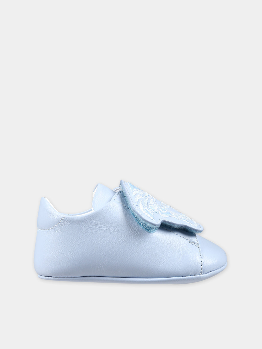 Light blue sneakers for babies with Medusa