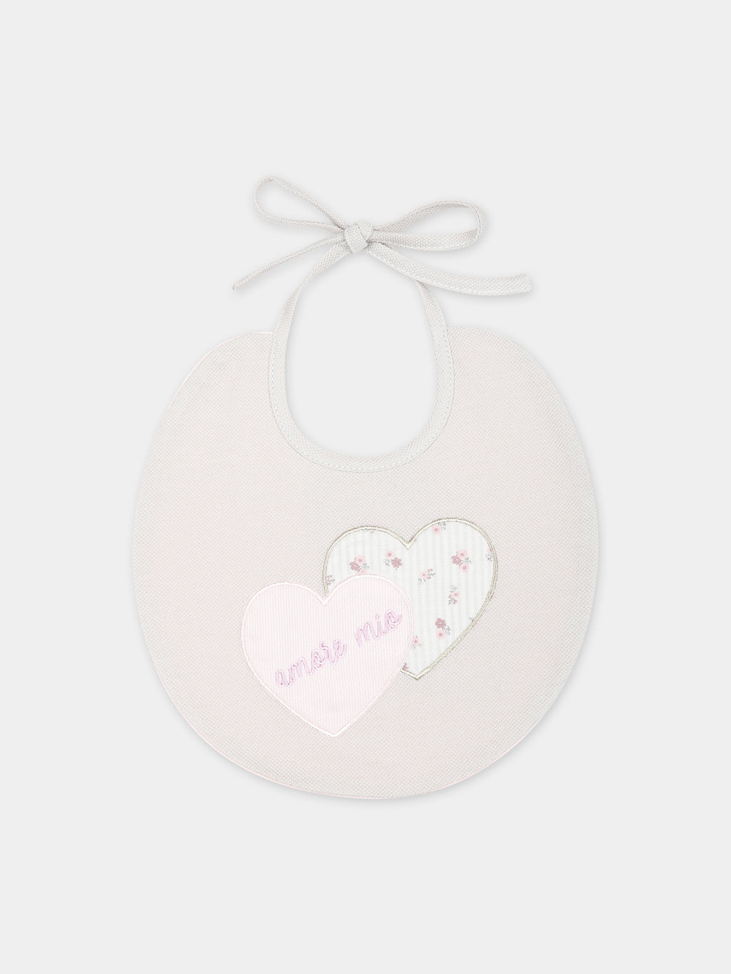 Beige bib for baby girl with hearts and writing