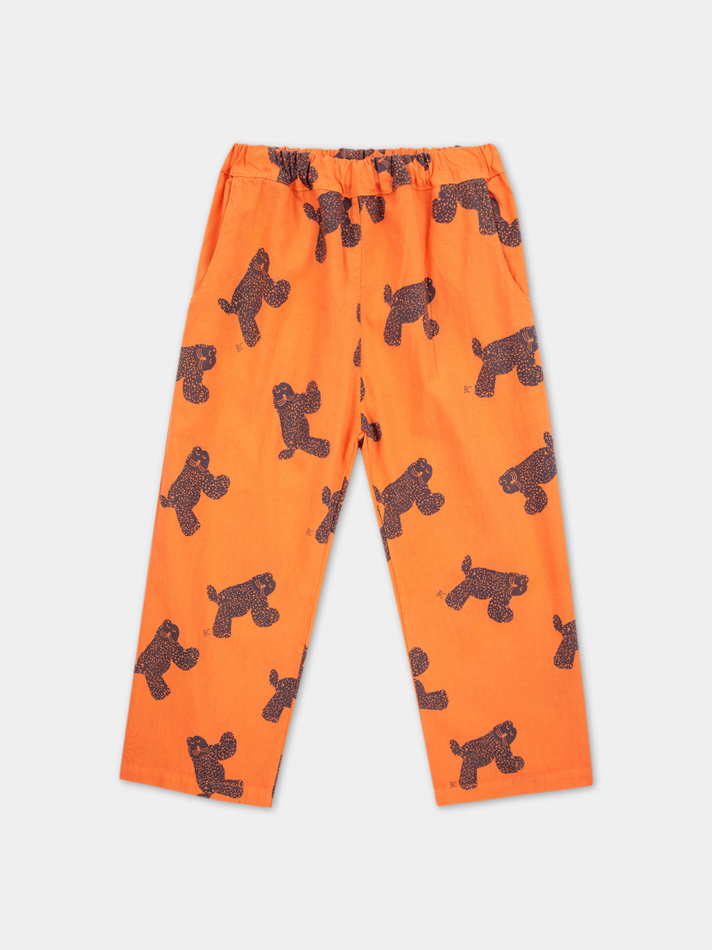 Orange trousers for kids with all-over cheetah pattern