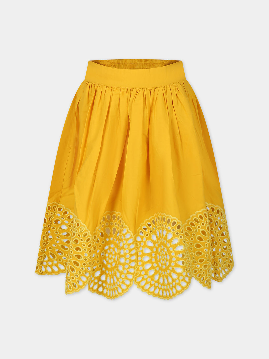 Yellow skirt for girl with macramé lace.