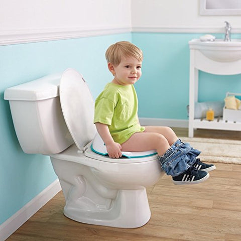 little boy using the toilet