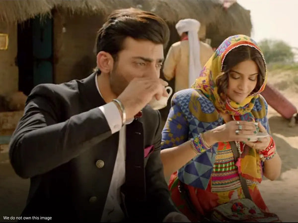 Fawad Khan and Sonam Kapoor sipping tea in Khoobsurat Movie