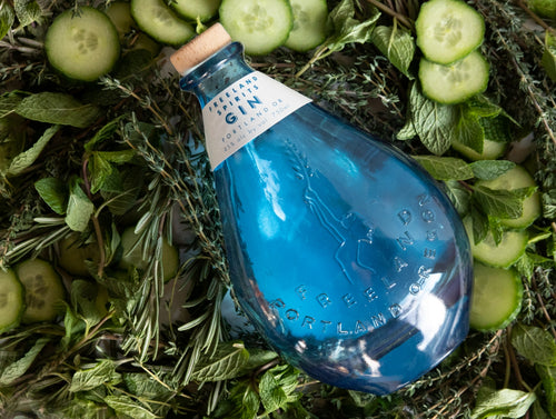 Freeland Gin on a bed of its fresh five cold distilled botanicals