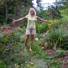 Me in my backyard garden, each plant contributes to the whole!