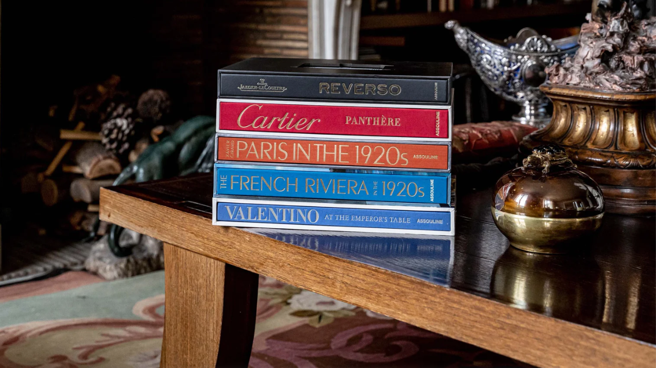 Assouline Legend Collection Iconic Luxury Coffee Table Books Styled on a table